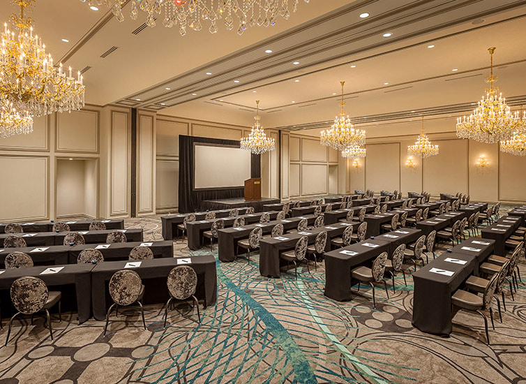 Architectural photo of a ballroom in classroom setup